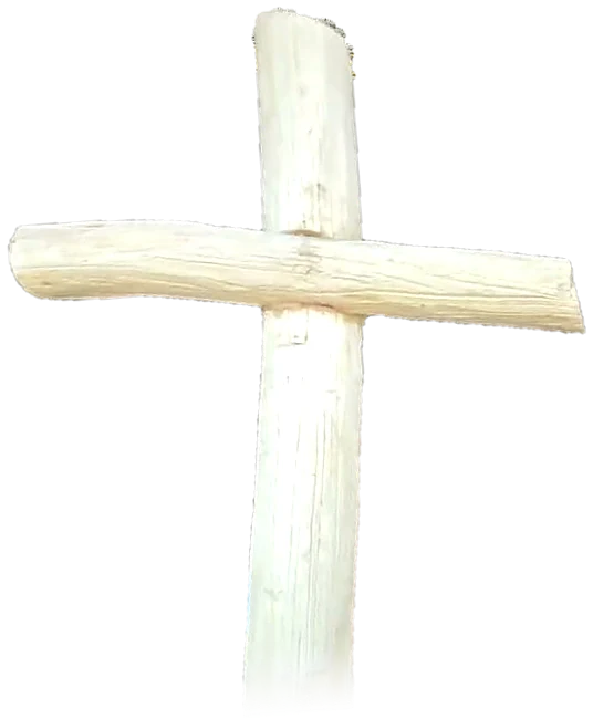 A peeled cross stripped down to pale wood
